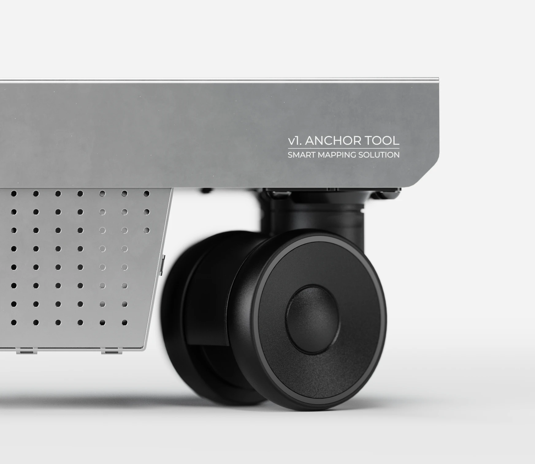 Close-up of the v1 Anchor Tool: a brushed steel housing with perforated panel on a black castor wheel